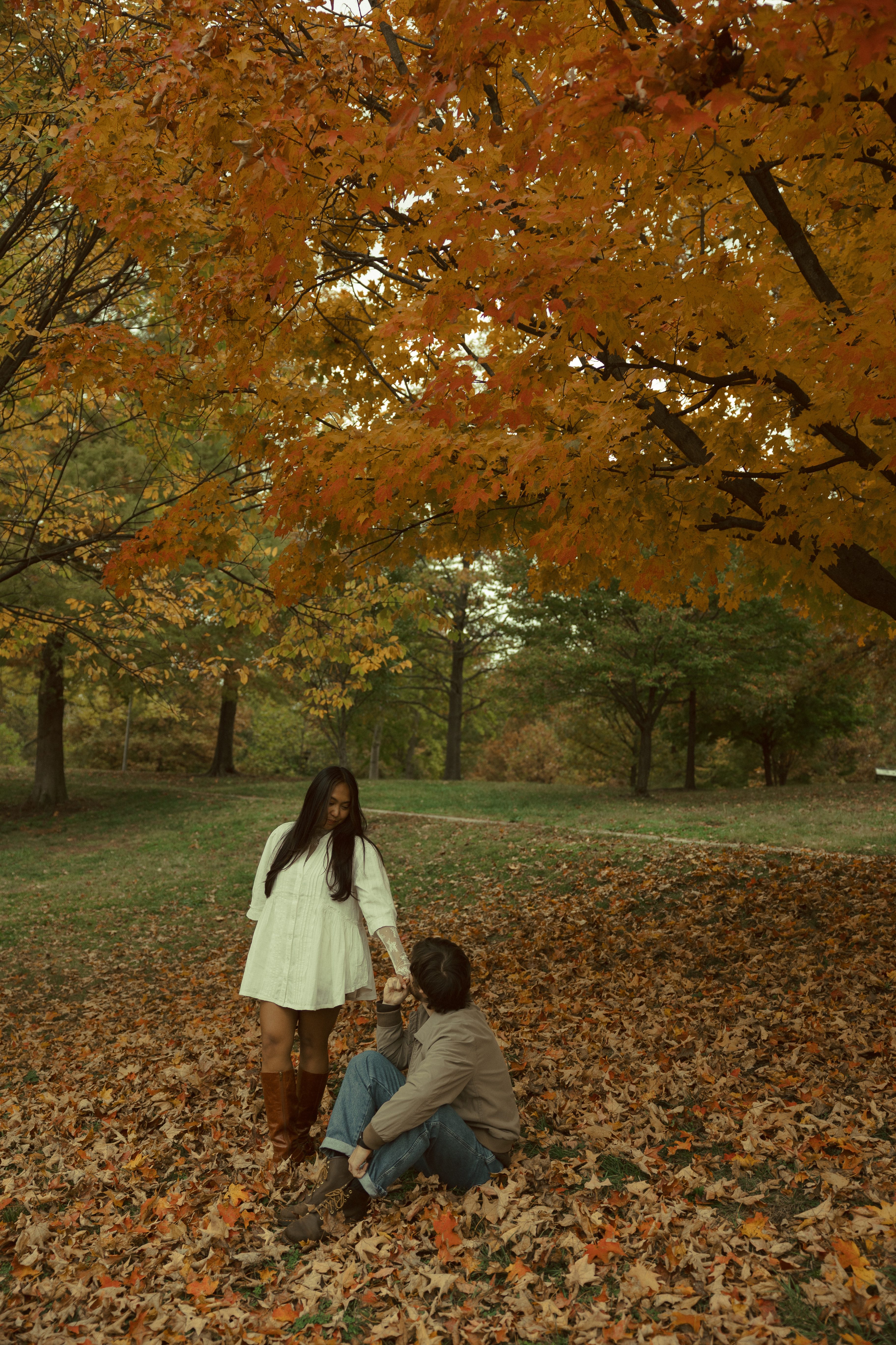 Kheya and Dylan in fall leaves