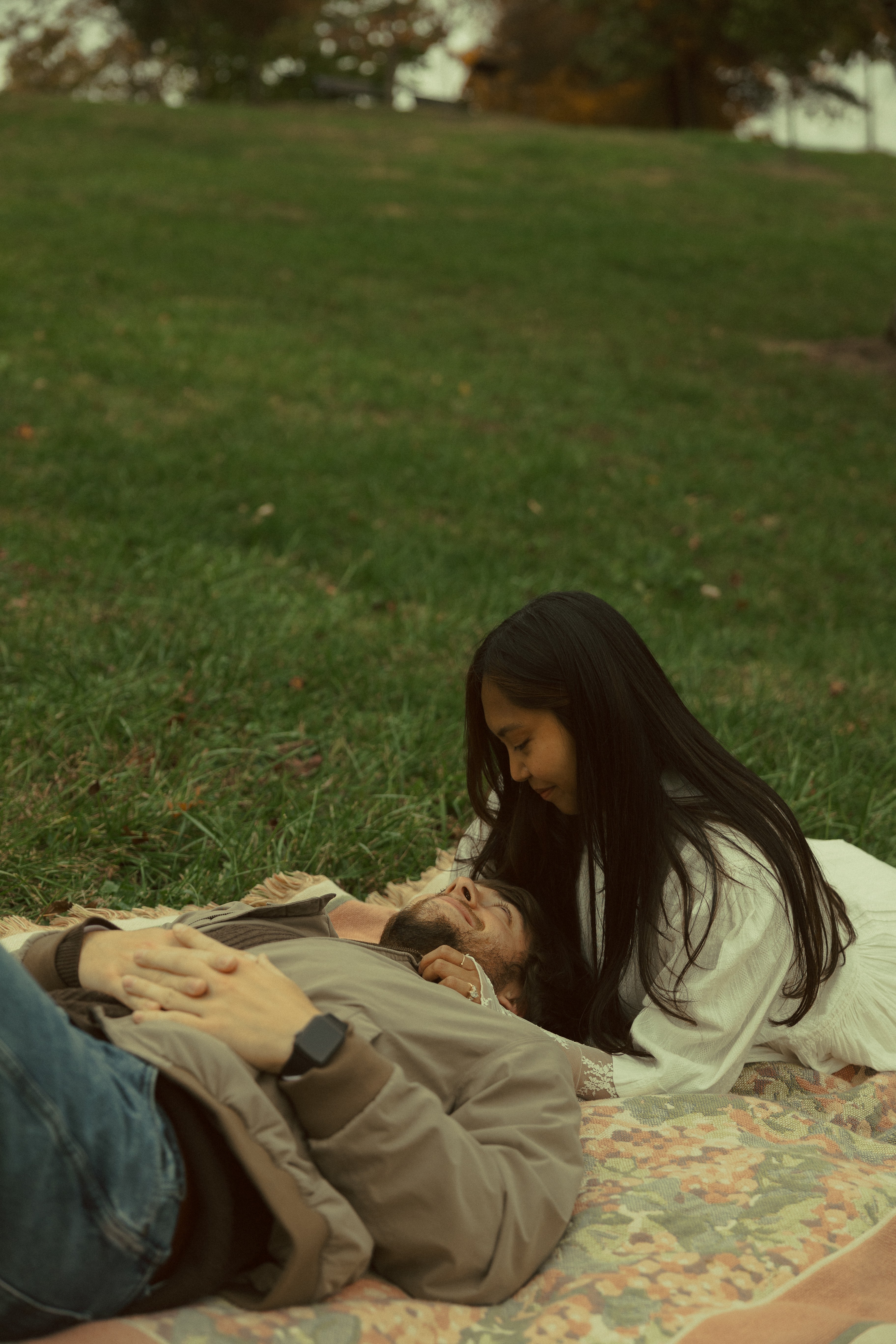 Kheya and Dylan on picnic blanket